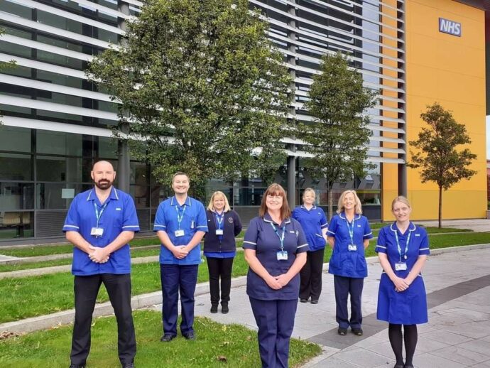 Nurses stood outside St Catherine's Health Centre